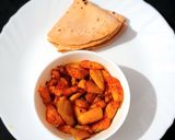 A picture of step 10 of Bihari Style Dry Parwal Aloo Masala.