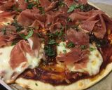 Foto del paso 6 de la receta Pizza “Serranita” con jamón serrano, mozzarella y tomate seco
