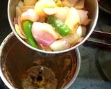 A picture of step 7 of Egg masala.