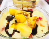 A picture of step 6 of Mango custard shots.
