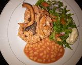 A picture of step 8 of Jollof Rice & Beans, wif salad.