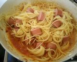 A picture of step 4 of Beef smokie Spaghetti with sauce.