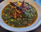 A picture of step 4 of Mustard Greens with Sweet Corn.