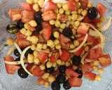 Foto del paso 3 de la receta: Ensalada de garbanzos con tomate, comino y cilantro