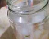 A picture of step 3 of Orange Mojito 🍊.