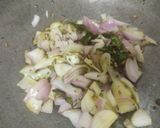 A picture of step 2 of Sweet and sour  Tomatoes and onion sabzi.