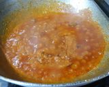 A picture of step 3 of Crab malai curry.