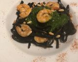 A picture of step 4 of Squid Ink Tagliolini with Grilled Shrimp, Mustard Pesto, and Toasted Pine Nuts.