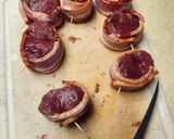 A picture of step 5 of Brad's bacon wrapped venison loin chops with port wine au jus and cucumber salad.