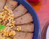 A picture of step 12 of Kibbee Busta (Baked Kibbee with onion and pine nuts).