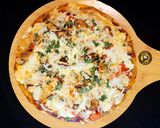 A picture of step 9 of Cheese Burst Veggies And Chicken Pizza From Scratch.