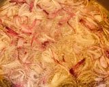 A picture of step 1 of Spicy matar pulao.