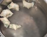 A picture of step 6 of Tofu Garlic Chive Dumplings in Chili Broth.