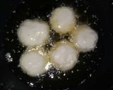 A picture of step 7 of Laddu stuffing bread puwa.