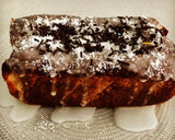 Foto del paso 4 de la receta: Bizcocho de coco con glaseado de limón y topping de chocolate y coco 🥥 (sin huevo 🥚)