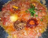 A picture of step 3 of Khageena (Spicy scrambled eggs).