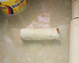 A picture of step 3 of Bread smokie rolls.