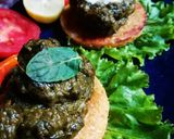 A picture of step 10 of Saag Gosht with Makkai Ki Roti.