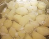 A picture of step 2 of My Battered sausage meat and mashed potato balls.