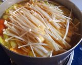 Hình bước làm 4 của món Canh chua nấm kim châm