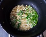 A picture of step 1 of Tamarind poha.