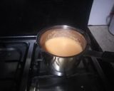 A picture of step 6 of Orange coloured Egg Pudding.