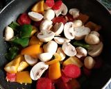 A picture of step 3 of Veg sizzler of sehezwan hakka noodles with sauteed vegetable.