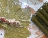 A picture of step 4 of Stuffed Grape Leaves with Chicken in a Pressure Cooker.