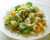 A picture of step 5 of Tortellini Pasta with white sauce.