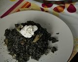 A picture of step 11 of Arroz Negro with Aioli.