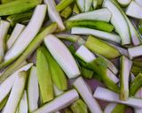 A picture of step 1 of Snake Gourd Sabji.