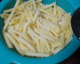 Foto del paso 5 de la receta Rollitos de cerdo con papas fritas y salsa a la pimienta