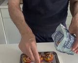 A picture of step 4 of Baked Peaches with Amaretti, Dark Chocolate, Ice Cream and Mint.