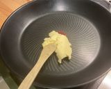 A picture of step 3 of Scrambled Eggs with Green Peppers, Red Onion, and Coulommiers Cheese.