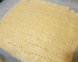 A picture of step 1 of Rich Cheesecake with Homemade Cookie Crust.