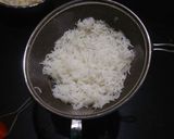 A picture of step 3 of Layered pasta rice.