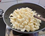 A picture of step 2 of Garlic potato fry.