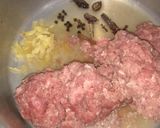 A picture of step 1 of Qeema Alo.