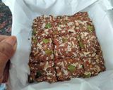 A picture of step 3 of Mixed seeds savoury chikki made in Air fryer.