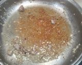 Foto del paso 2 de la receta: Arroz meloso de pollo al ajillo