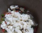 A picture of step 2 of Cauliflower French Beans and Green Peas Curry.