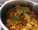 A picture of step 3 of Aloo chorifali and tomato sabji.