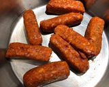 A picture of step 1 of Italian Sausage with Rice 🍚.