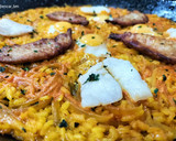 Foto del paso 9 de la receta: Arroz con cebolla, bacalao, boquerones y huevos de codorniz