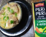 A picture of step 4 of Peri lemon karahi.