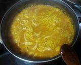 Foto del paso 4 de la receta Arroz amarillo con calamares y gambas