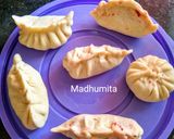 A picture of step 4 of Veg Momos (with beetroot stuffing).