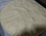 Foto del paso 5 de la receta Trenza de hojaldre, crema pastelera y pasas