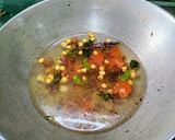 A picture of step 4 of Onion Tomato Upma.