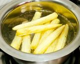 A picture of step 1 of #Restaurant style cheese tandoori baby corn.